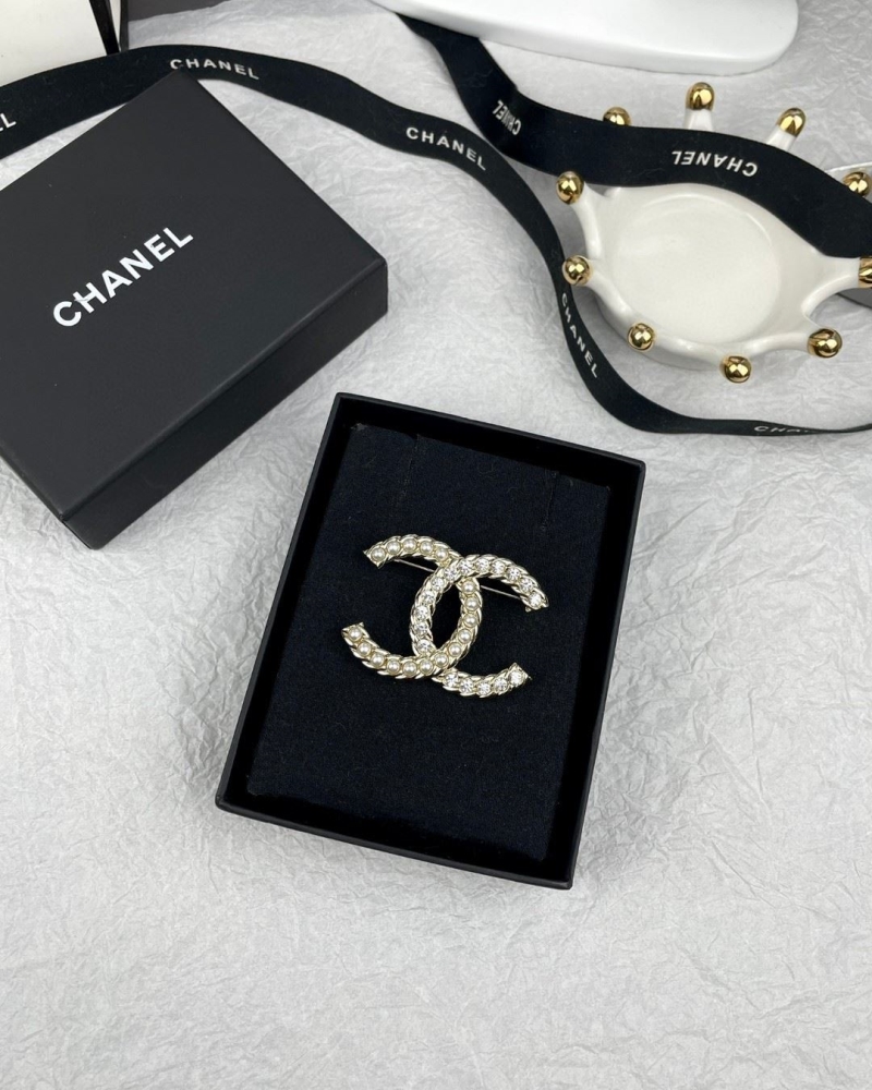Ch**el brooches